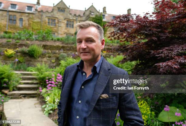 Garden designer Chris Beardshaw poses for pictures during a media event for the launch of the new arts and crafts style garden he has designed for...