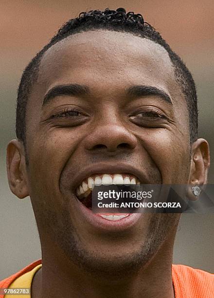 Brazilian forward Robinho shares a joke with some teammates after a practice on October 10, 2008 in Teresopolis, 150 km from Rio de Janeiro. Brazil's...