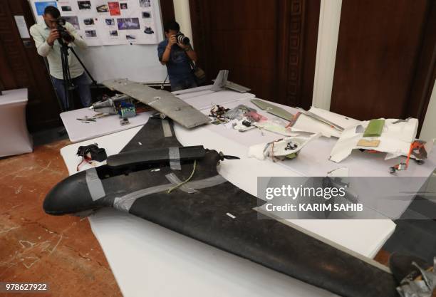 Picture taken on June 19, 2018 in Abu Dhabi shows a drone Emirati armed forces say were used by Huthi rebels in Yemen in battles against the...