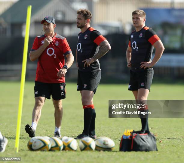 Scott Wisemantel, the England attack coach looks on with Danny Cipriani and Owen Farrell during the England training session held at Kings Park on...