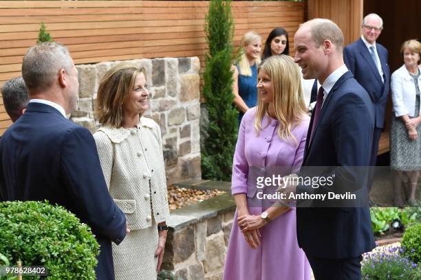 The Duke of Cambridge and Clare Milford Haven speak with garden designer Louise del Balzo during a visit to James' Place in Liverpool on June 19,...