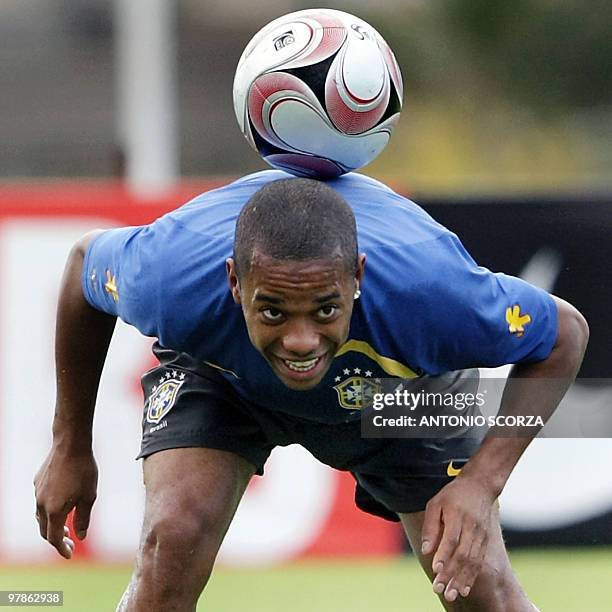 Brazilian footballer Robinho controls the ball during a training session of the national team on June 11 in Teresopolis, Brazil. Brazil will face...