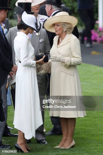 Prince Harry, Duke of Sussex, Meghan, Duchess of Sussex and Camilla, Duchess of Cornwall attend Royal Ascot Day 1 at Ascot Racecourse on June 19,...