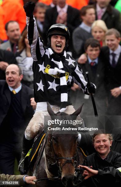 Paddy Brennan celebrates after riding Imperial Commander to victory in the Totesport Cheltenham Gold Cup on Day Four of the Cheltenham Festival on...