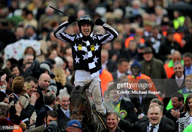 Paddy Brennan on Imperial Commander celebrates winning The Totesport Cheltenham Gold Cup Steeple Chase on Day 4 of the Cheltenham Festival on March...