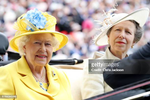Queen Elizabeth II and Princess Anne, Princess Royal arrive by carriage to Royal Ascot Day 1 at Ascot Racecourse on June 19, 2018 in Ascot, United...