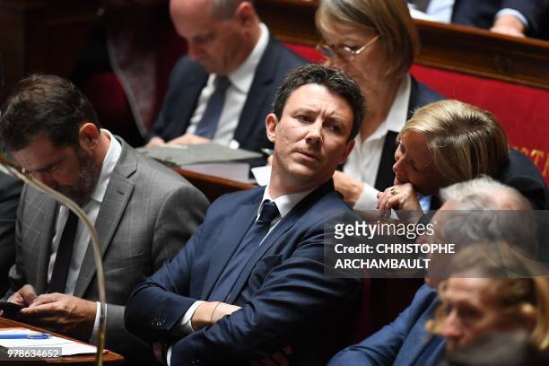 French Government's Spokesperson Benjamin Griveaux listens to French Junior Minister for Disability Issues Sophie Cluzel during a session of...
