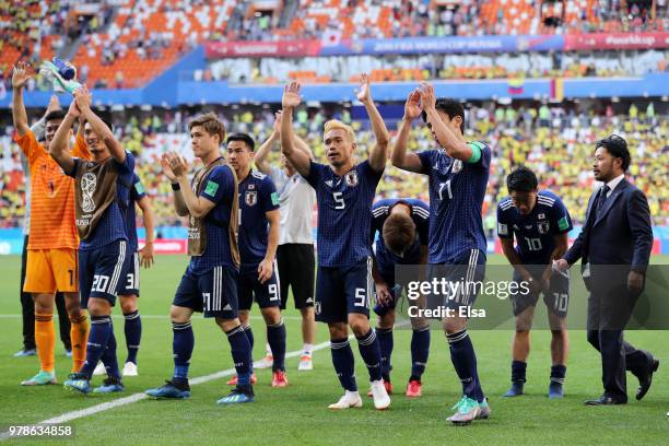 Yuto Nagatomo and Makoto Hasebe of Japan celebrate after the 2018 FIFA World Cup Russia group H match between Colombia and Japan at Mordovia Arena on...