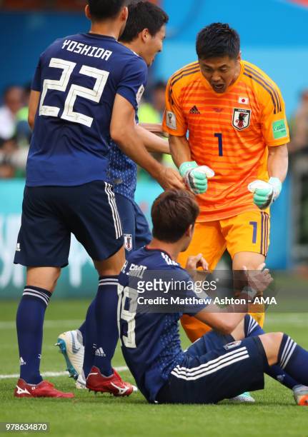 Hiroki Sakai of Japan celebrates with Eiji Kawashima of Japan at the end of the 2018 FIFA World Cup Russia group H match between Colombia and Japan...