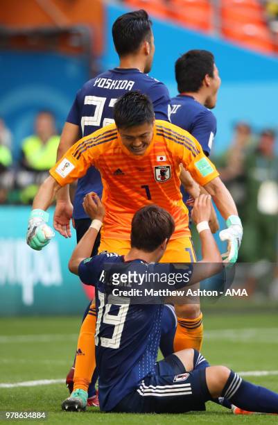 Hiroki Sakai of Japan celebrates with Eiji Kawashima of Japan at the end of the 2018 FIFA World Cup Russia group H match between Colombia and Japan...