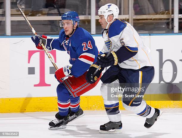 Ryan Callahan of the New York Rangers skates against Barret Jackman of the St. Louis Blues in the first period on March 18, 2010 at Madison Square...