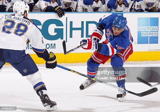 Marian Gaborik of the New York Rangers takes a shot against the St. Louis Blues on March 18, 2010 at Madison Square Garden in New York City. The...