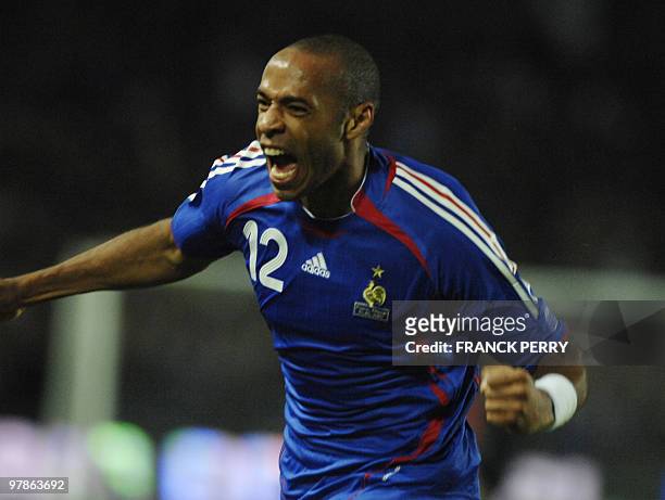 French forward Thierry Henry celebrates after scoring during the Euro 2008 qualifying match France vs Lithuania, 17 October 2007 at the Beaujoire...