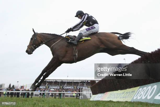 Paddy Brennan rides Imperial Commander to victory in the Totesport Cheltenham Gold Cup on Day Four of the Cheltenham Festival on March 19, 2010 in...