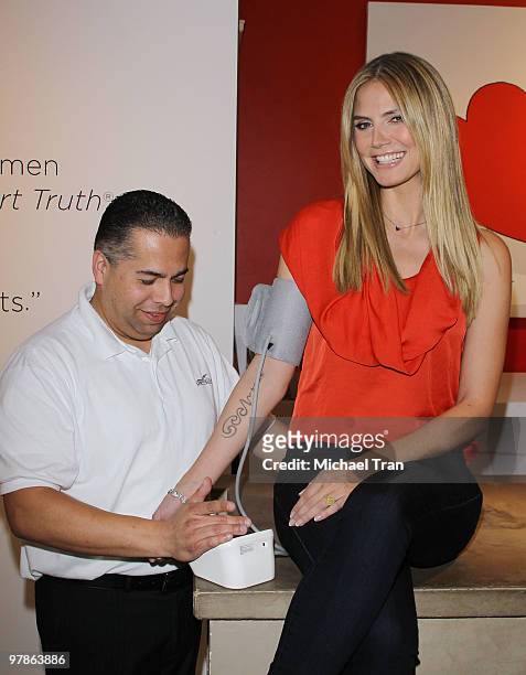 Heidi Klum gets a high blood pressure test at the "Pop-Up" Experience held at the 3rd Street Promenade on March 19, 2010 in Santa Monica, California.