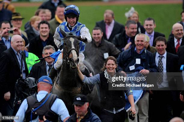 Andrew Lynch celebrates riding Berties Dream to victory in The Albert Bartlett Novices' Hurdle Race on Day 4 of the Cheltenham Festival on March 19,...