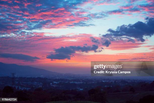 dramatic sunset at mountains of costa rica - cartago province stock pictures, royalty-free photos & images