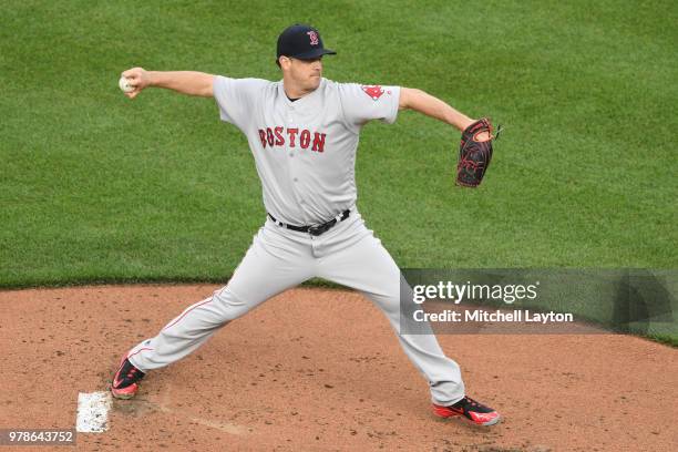 Steven Wright of the Boston Red Sox pitches during a baseball game against the Baltimore Orioles at Oriole Park at Camden Yards on June 11, 2018 in...