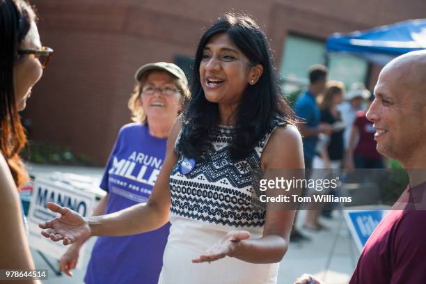 Aruna Miller, who is running for the Democratic nomination in Maryland's 6th Congressional District, talks with citizens during early voting at the...