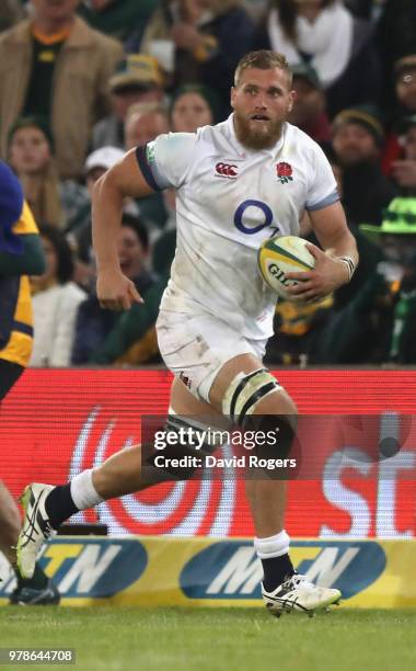 Brad Shields of England runs with the ball during the second test match between South Africa and England at Toyota Stadium on June 16, 2018 in...