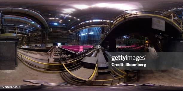 Image was created as an Equirectangular Panorama. Import image into a panoramic player to create an interactive 360 degree view.) Red hot steel slabs...