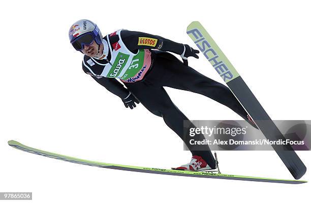 Adam Malysz of Poland soars through the air during the individual event of the Ski jumping World Championships on March 19, 2010 in Planica, Slovenia.