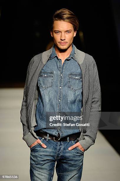 Model showcases designs on the catwalk by Jeanswest as part of the LMFF Fashion Collections 4 on the fifth day of the 2010 L'Oreal Melbourne Fashion...