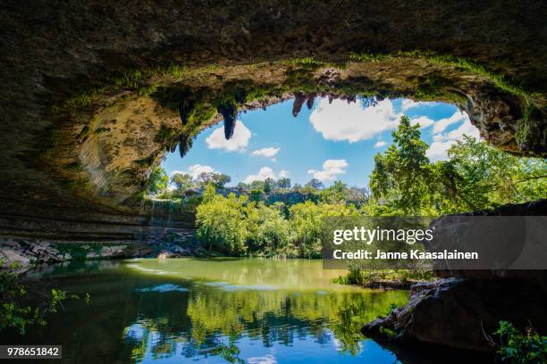 view of hamilton pool reserve, austin, texas, usa - stalactiet stockfoto's en -beelden