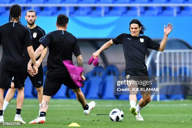 Uruguay's forward Edinson Cavani and his teammates take part in a training session at the Rostov Arena in Rostov-On-Don on June 19 on the eve of the...