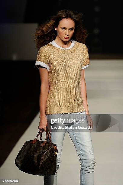 Model showcases designs on the catwalk by Jeanswest as part of the LMFF Fashion Collections 4 on the fifth day of the 2010 L'Oreal Melbourne Fashion...