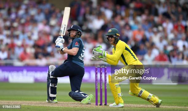 Jonathan Bairstow of England bats watched by Australia wicketkeeper Tim Paine during the 3rd Royal London ODI match between England and Australia at...