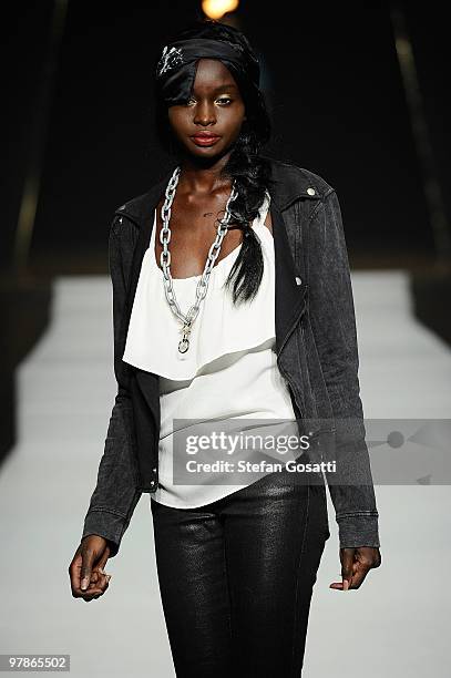 Model showcases designs on the catwalk by Jeanswest as part of the LMFF Fashion Collections 4 on the fifth day of the 2010 L'Oreal Melbourne Fashion...