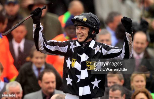 Paddy Brennan celebrates after riding Imperial Commander to victory in the Totesport Cheltenham Gold Cup on Day Four of the Cheltenham Festival on...