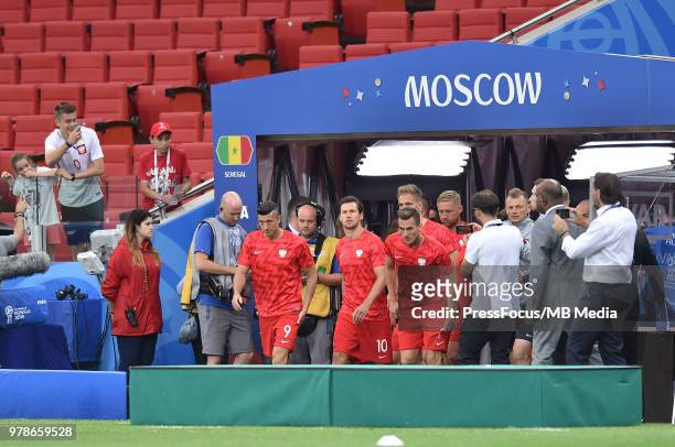 Robert Lewandowski, Grzegorz Krychowiak and Arkadiusz Milik of Poland during warm up before the 2018 FIFA World Cup Russia group H match between...