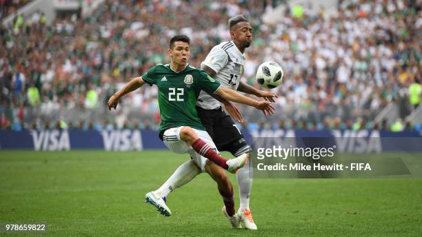 Hirving Lozano of Mexico is fouled by Jerome Boateng of Germany during the 2018 FIFA World Cup Russia group F match between Germany and Mexico at...