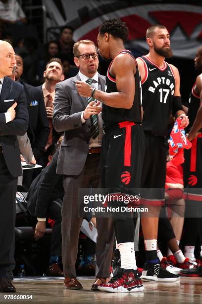 Nick Nurse speaks to Demar Derozan of the Toronto Raptors during the game against the Washington Wizards in Game Three of Round One of the 2018 NBA...