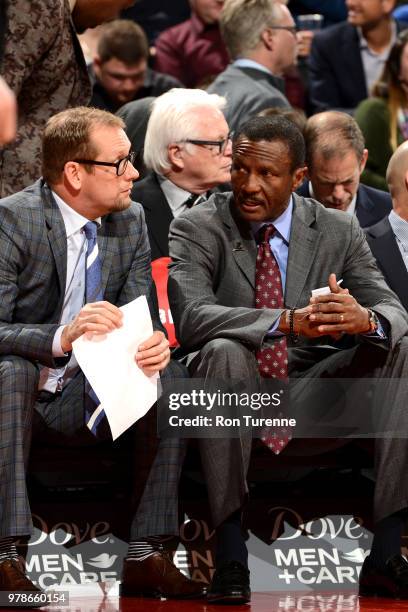 Head Coach Dwayne Casey talks to Nick Nurse of the Toronto Raptors during the game against the Brooklyn Nets on December 15, 2017 at the Air Canada...