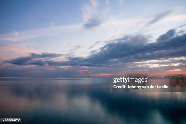 sunset @ utila bay islands - utila honduras stock pictures, royalty-free photos & images