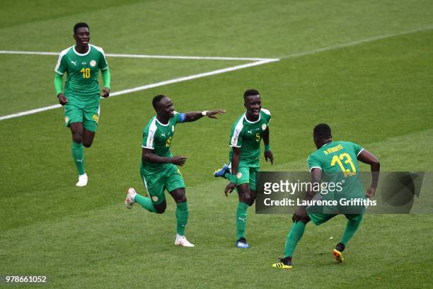 Idrissa Gana Gueye of Senegal celebrates the first Senegal goal with Mbaye Niang, Ismaila Sarr and Alfred Ndiaye of Senegal during the 2018 FIFA...