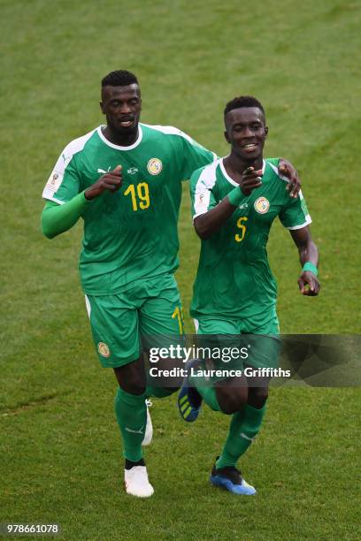 Idrissa Gana Gueye of Senegal celebrates the first Senegal goal with Mbaye Niang of Senegal during the 2018 FIFA World Cup Russia group H match...