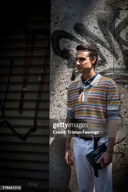 Man is seen outside the Dolce & Gabbana show during Milan Men's Fashion Week Spring/Summer 2019 on June 16, 2018 in Milan, Italy.