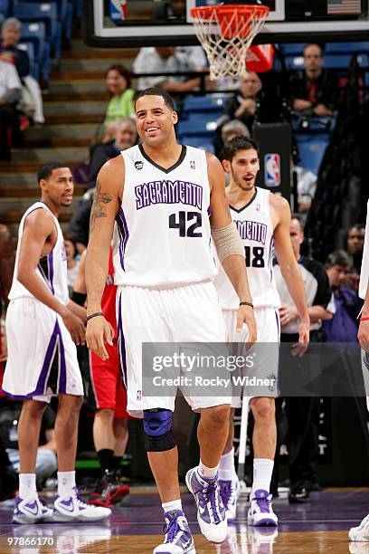 Sean May of the Sacramento Kings looks on with a smile during the game against the Toronto Raptors at Arco Arena on March 10, 2010 in Sacramento,...