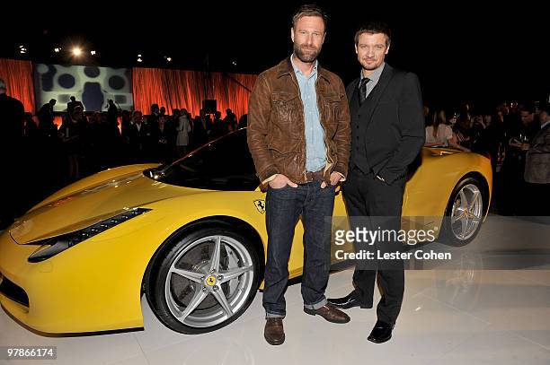 Actors Aaron Eckhart and Jeremy Renner attend the Ferrari 458 Italia auction event to benefit Haiti held at Fleur de Lys on March 18, 2010 in Los...
