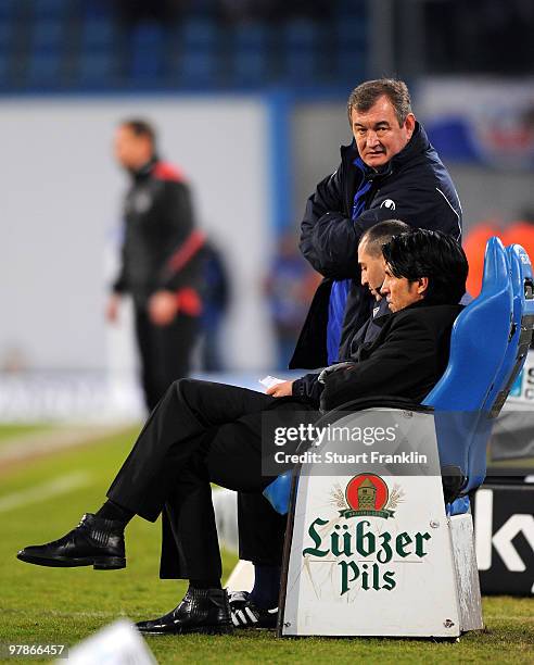 Bruno Huebner, Manager of Duisburg talks with Milan Sasic, head coach of Duisburg during the Second Bundesliga match between FC Hansa Rostock and MSV...