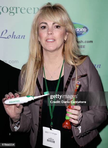 Dina Lohan introduces the "Aqua Freedom Green Lohan Toothbrush" at Pier 92 on March 19, 2010 in New York City.