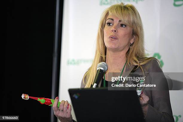 Dina Lohan introduces the "Aqua Freedom Green Lohan Toothbrush" at Pier 92 on March 19, 2010 in New York City.