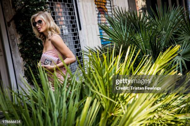 Xenia Adonts is seen outside the Dolce & Gabbana show during Milan Men's Fashion Week Spring/Summer 2019 on June 16, 2018 in Milan, Italy.