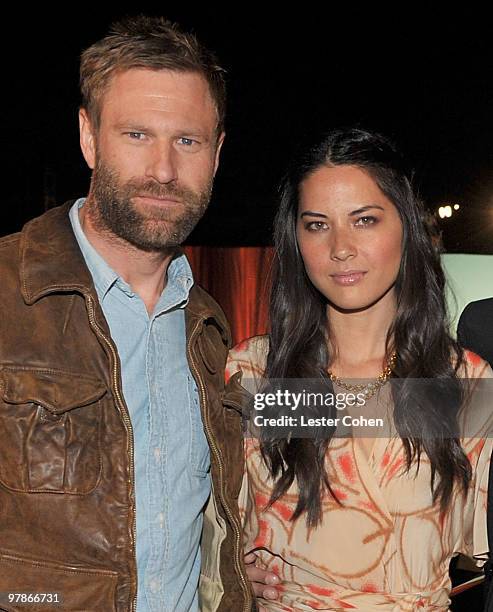 Actor Aaron Eckhart and actress Olivia Munn attend the Ferrari 458 Italia auction event to benefit Haiti held at Fleur de Lys on March 18, 2010 in...