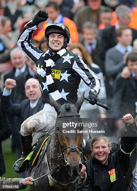 Paddy Brennan riding Imperial Commander celebrates winning the Gold Cup at the Cheltenham Festival on March 19, 2010 in Cheltenham, England.