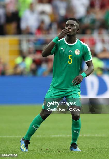 Idrissa Gana Gueye of Senegal celebrates after his shot is deflected in causing an own goal, his team's first goal during the 2018 FIFA World Cup...
